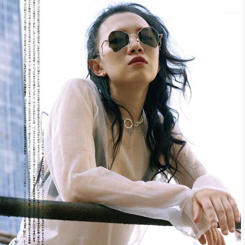 

20220 new metal frame sunglasses female fashion literary irregular sunglasses male1