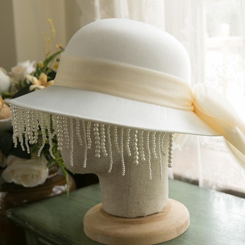 

Stingy Brim Hats Hepburn Style French Pearls Fascinator Wedding Bridal Hat White Po Headwear Travel Hair Accessory Lady Large Bowknot Fedora