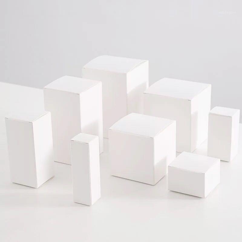 

10pcs/lot Small White Kraft Paper cardboard box,Essential Oils Packaging Boxes,Rectangle Cosmetic Perfume Bottle Gift Paper Box1