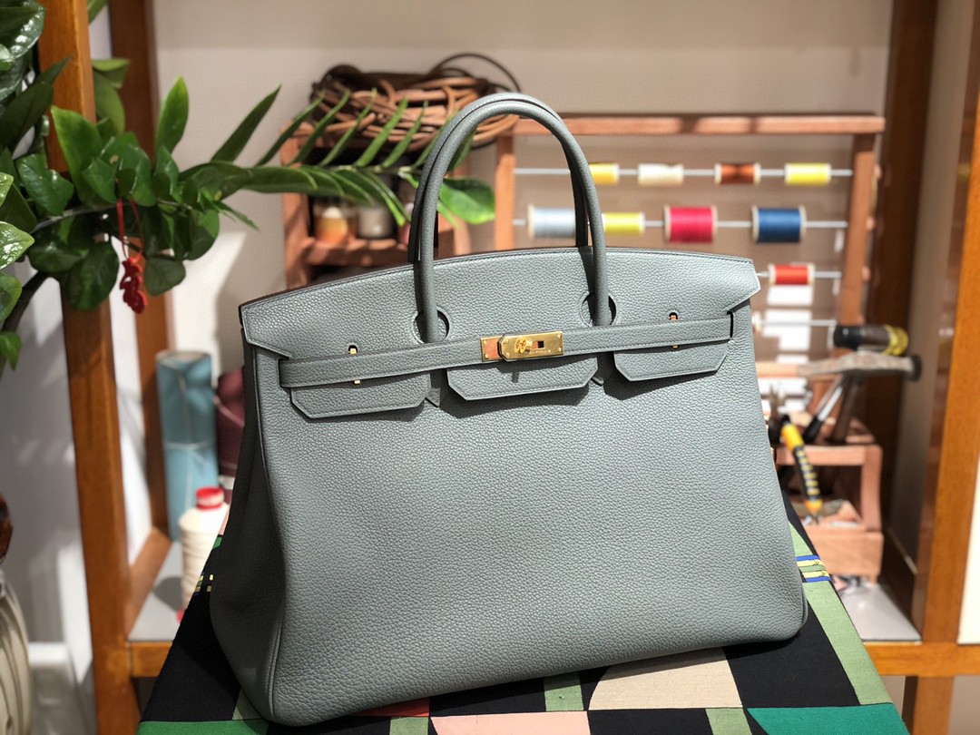 

mens handbag 40cm,brand bag, fully handmade quality,togo leather,wax line stitching,gold or silver hardware,by order only dont have in stock, Pewter