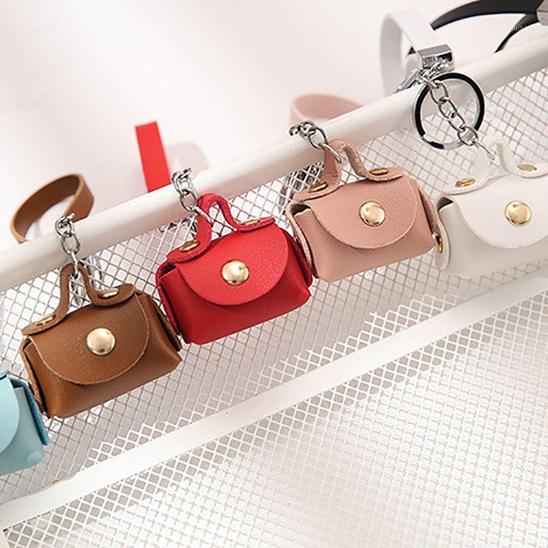 

New creative coin purse keychain Car key ring Female bag pendant Fashion personalized key ring Jewelry chains Various Colors1