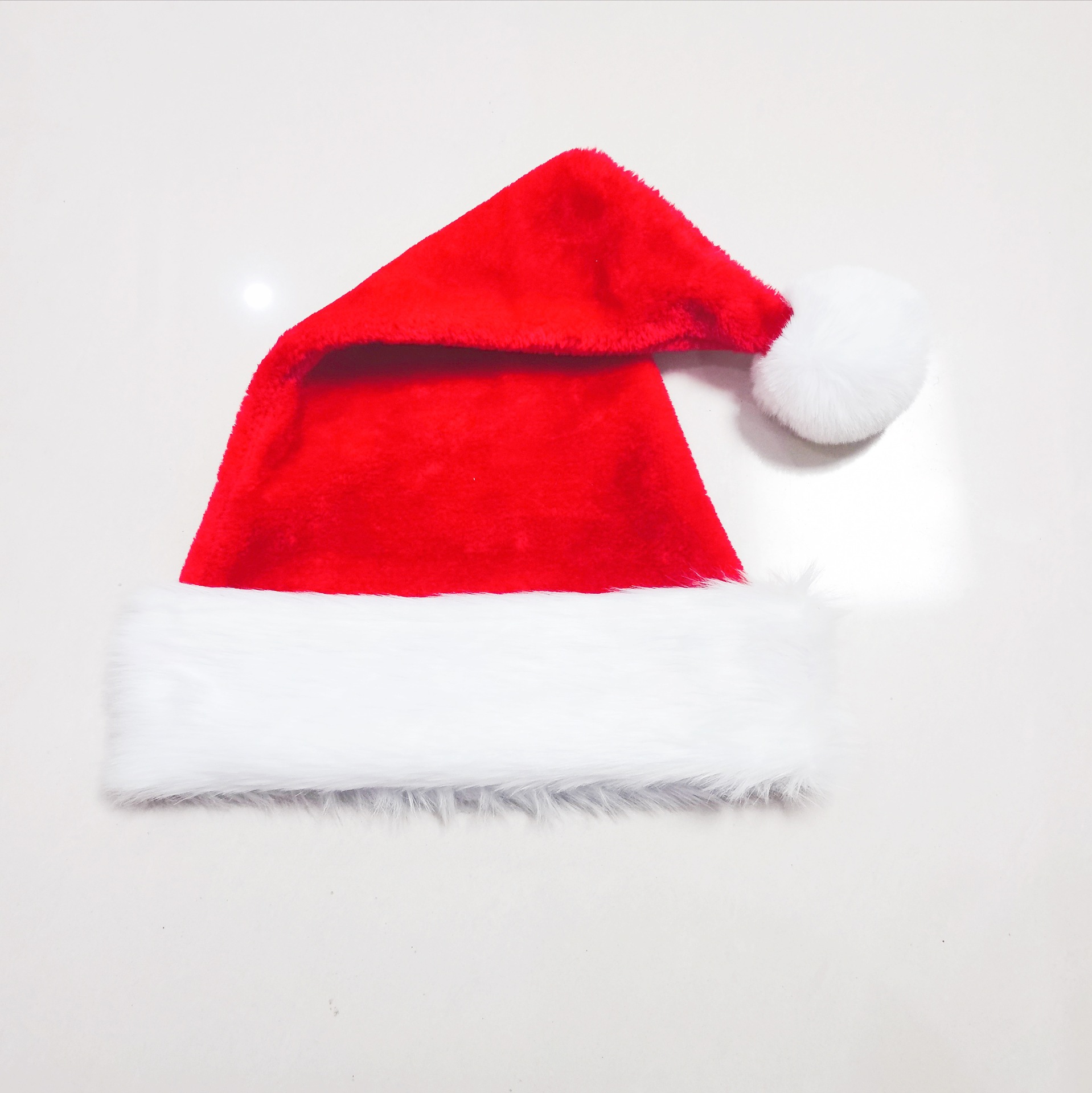 

2020 Hot style Wholesale plush red Santa hat extra thick extra Christmas decorations