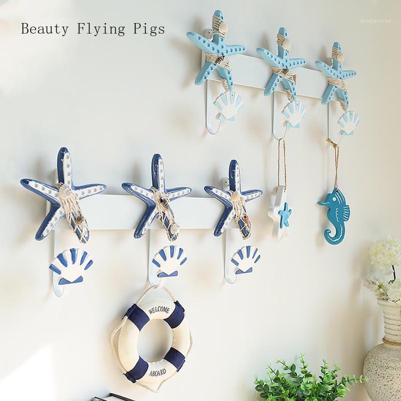

Creative starfish shell hook key frame decoration wall hanging door personality wall clothing store home decoration hook1