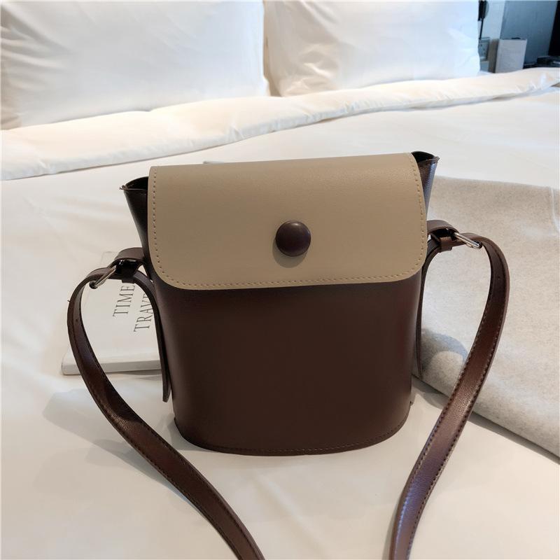 

New ladies shoulder bag simple messenger bag sen texture contrast color bucket mobile phone change small black female