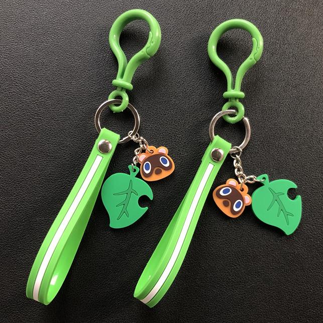 

Keychains 2021 Switch Game Animal Crossing Keychain Fashion Car Keyring Charm Bag Pendant Cute PVC Leaf Gift