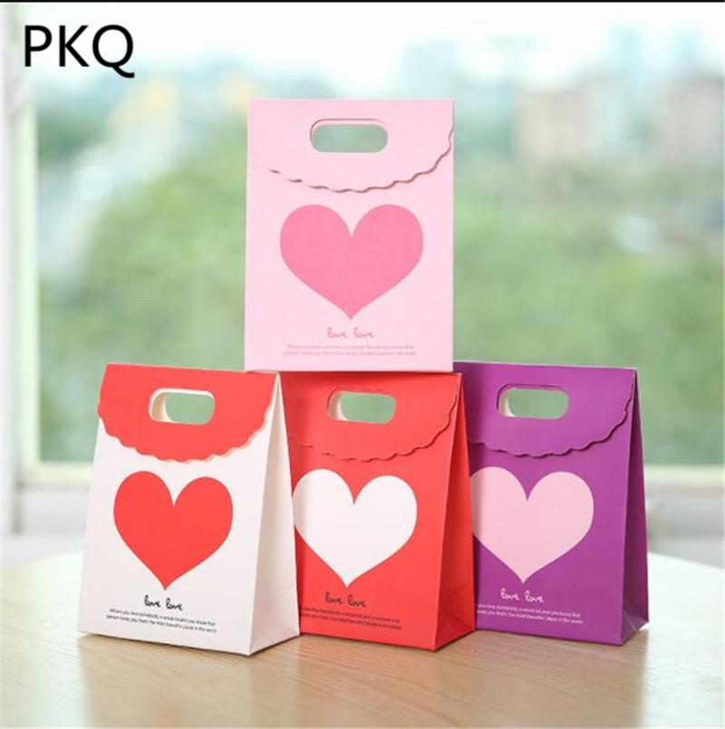 

20pcs 12*6*16cm kraft paper gift bag with handles Festival gift bags DIY multifunction Jewelry Packaging bags