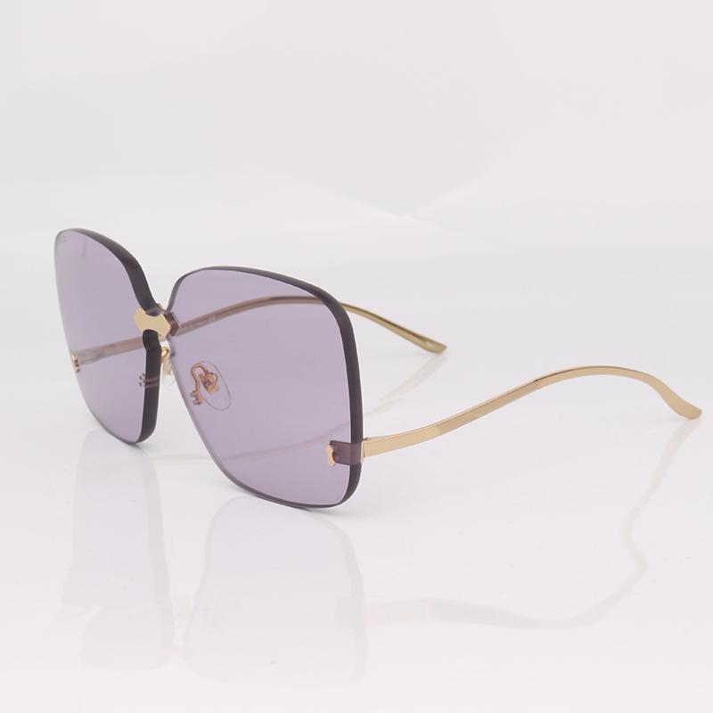 

Over size rimless sunglasses women purple lense with temples at the bottom