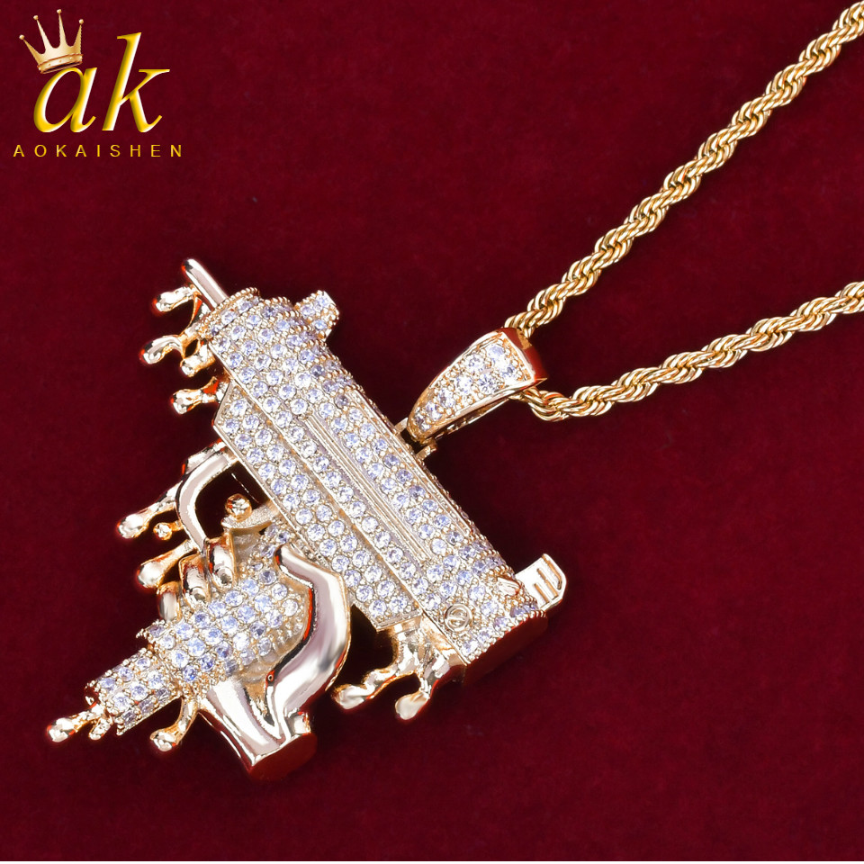 

Ice-Out Gun Pendant for Men Gold Color Matterial Copper Cubic Zircons Hip Hop Rock Street Charms Jewelry With Rope Chain