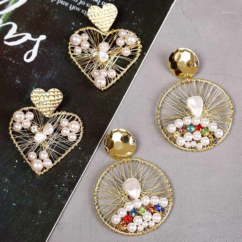 

Creative Handmade Winding Metal Wire Heart Round Geometric Drop Earrings Women's Fashion Boho Beaded White Pearl Earring Jewelry1