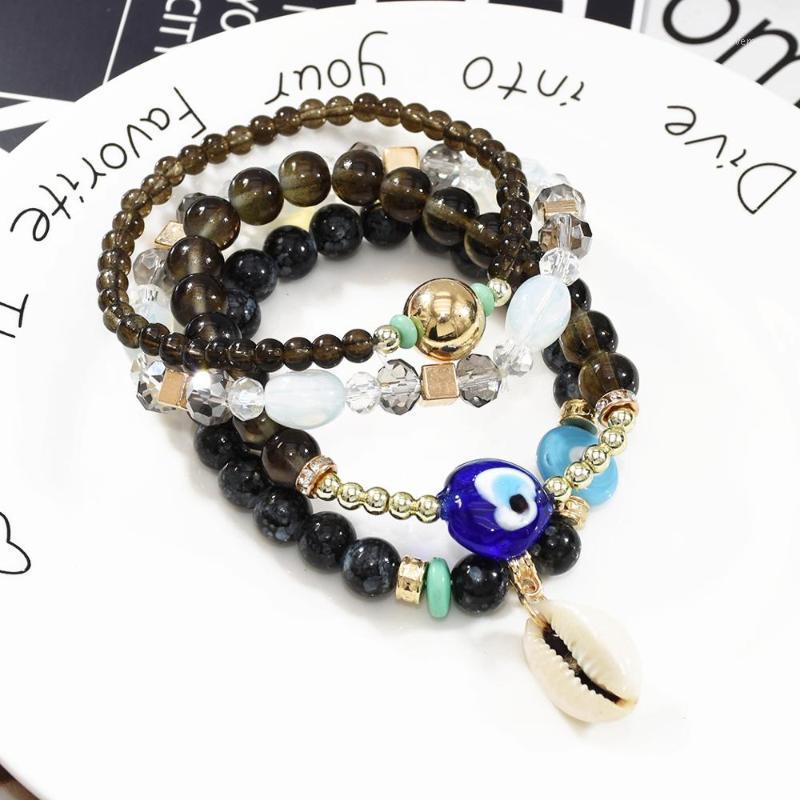 

4pcs/set Bohemian Ethnic Multilayer Vintage New shell pendant Beads Bracelets Statement Tassel Pearl Charms Wrap Bracelet Bangle1