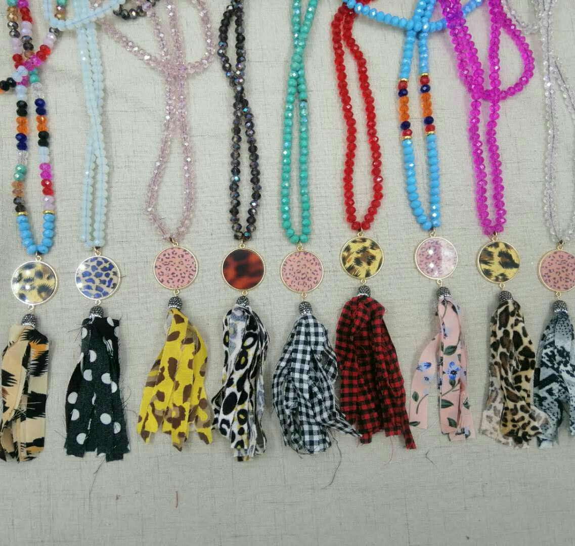 Collier pendentif en cristal coloré perlé fait à la main européen et américain pompon femme chaîne de chandail arc turquoise blanc