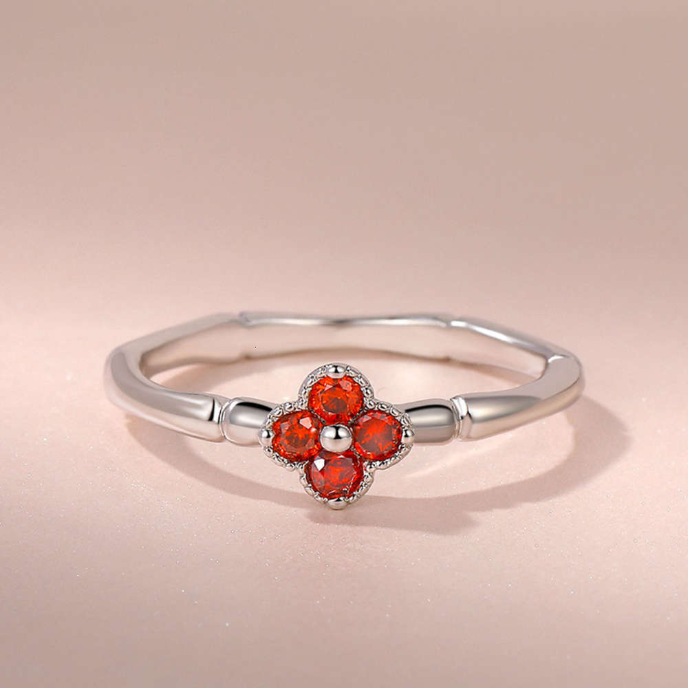 

Luxurys Designers Fashion Jz088 platinum plated and color preserved red garnet slub couple's joint ring women's Clover ring diamond ring