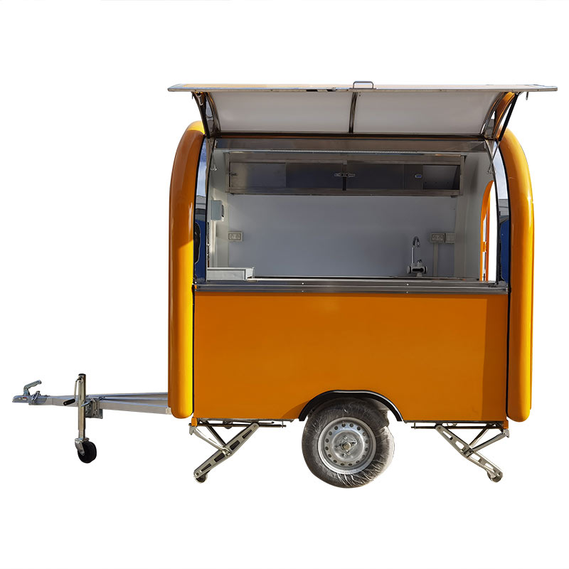 

small yellow food truck food trailer
