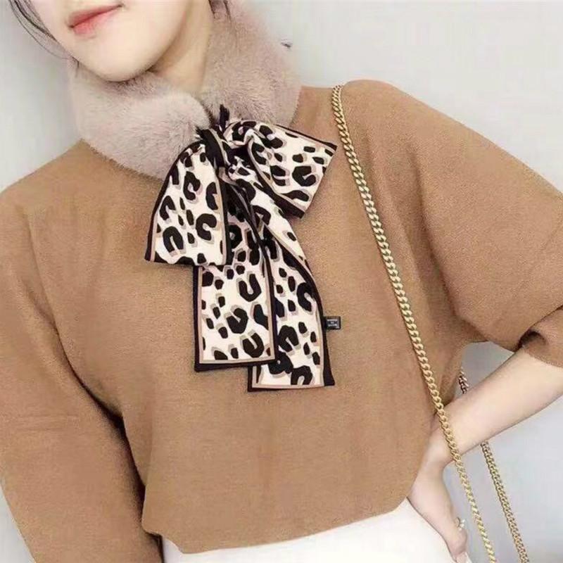 

Autumn and winter Korean scarf plush padded warm leopard bow ribbon scarf factory wholesale