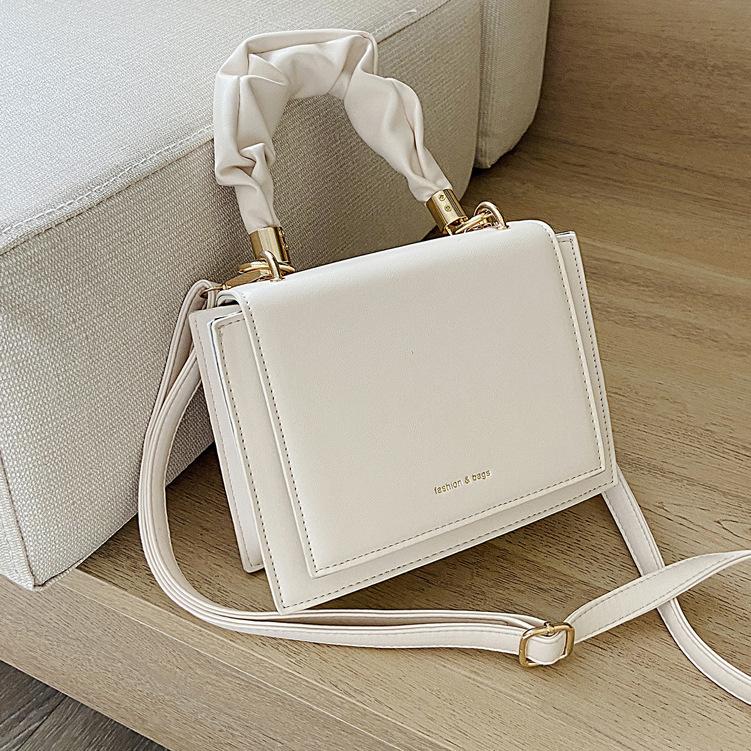 

Textured women's small bag 2021 spring new trend Korean version of the wild one-shoulder messenger small square bag fold handbag, Black
