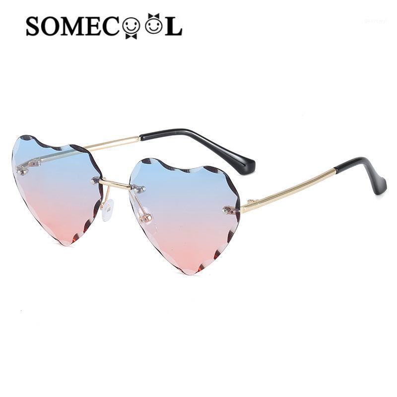 

Brand New sunglasses for kids UV400 Rimless Beach Sea eyewear Cute Heart shapes Children sunglasses Metal leg n2241