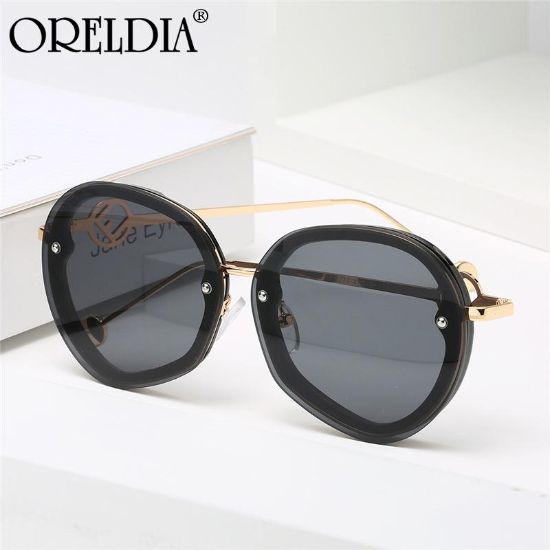 

2021 New Round Rimless Sunglasses Ladies Fashion Irregular Metal Temple Glasses Gradient Color Lens Men's Sunglasses Hot UV400
