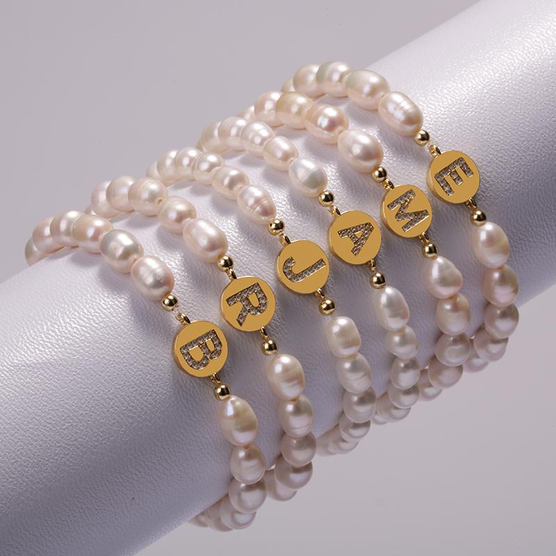 

2020 New Design Bohemia gold initial 26 alphabet letter name CZ charm Natural Freshwater Pearl Beaded Unisex Couples Bracelet