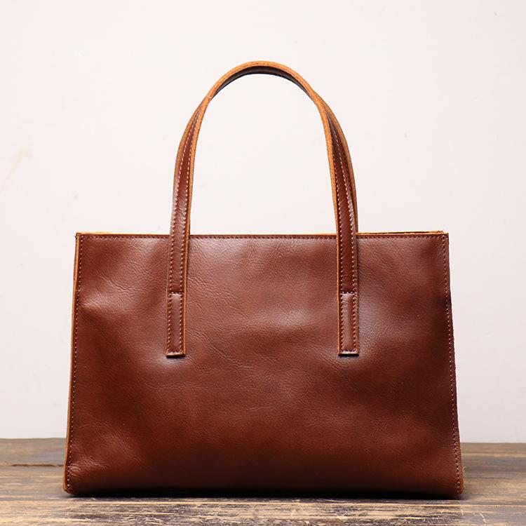 

2021 new leather hand-held women's bag, one shoulder Crossbody Bag, simple and versatile women's small square bag, Brown.