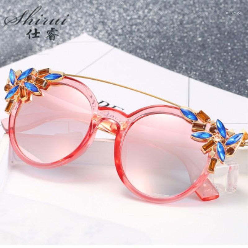 

New Summer Autumn Beach Fashion Sunglasses Women Brand Designer Rhinestone Unique Luxury Pink Lady Sun Glasses De Sol Mujer1