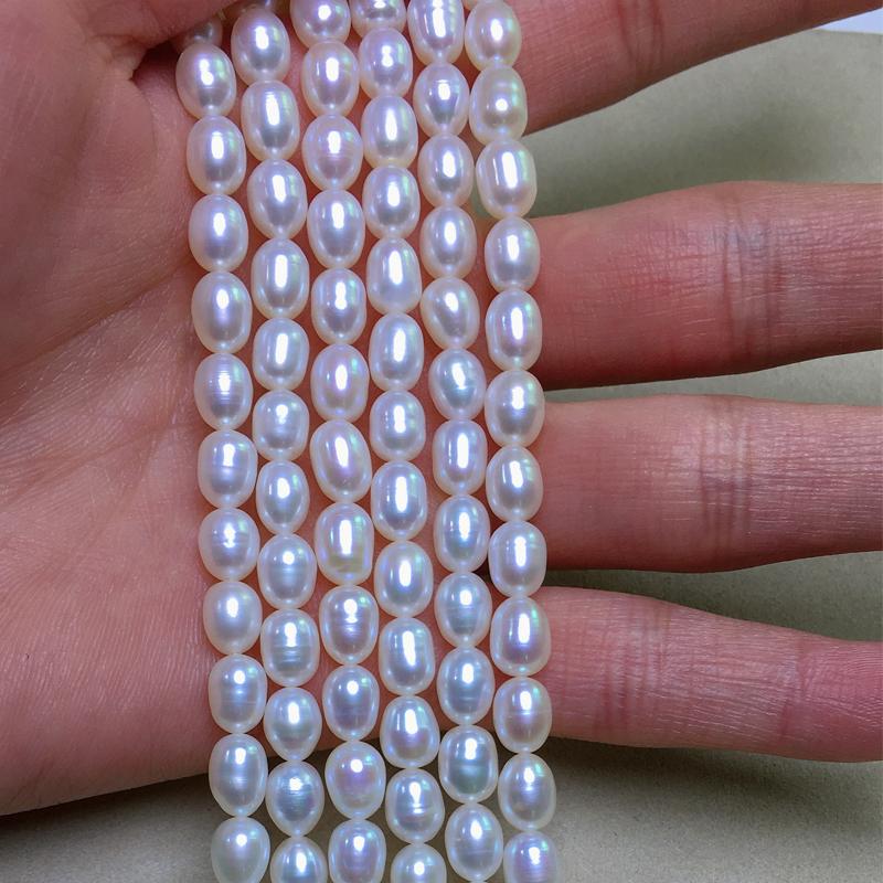 

Freshwater Pearl necklace Rice shape with Size mm loose pearl strands