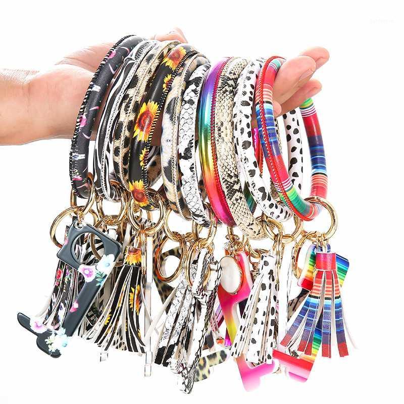 

1Pcs Multi-color No-Touch Door Opener Keychain Safe Door Handle Leather Keyring Portable Elevator Tool Tassel Keychain Jewelry1