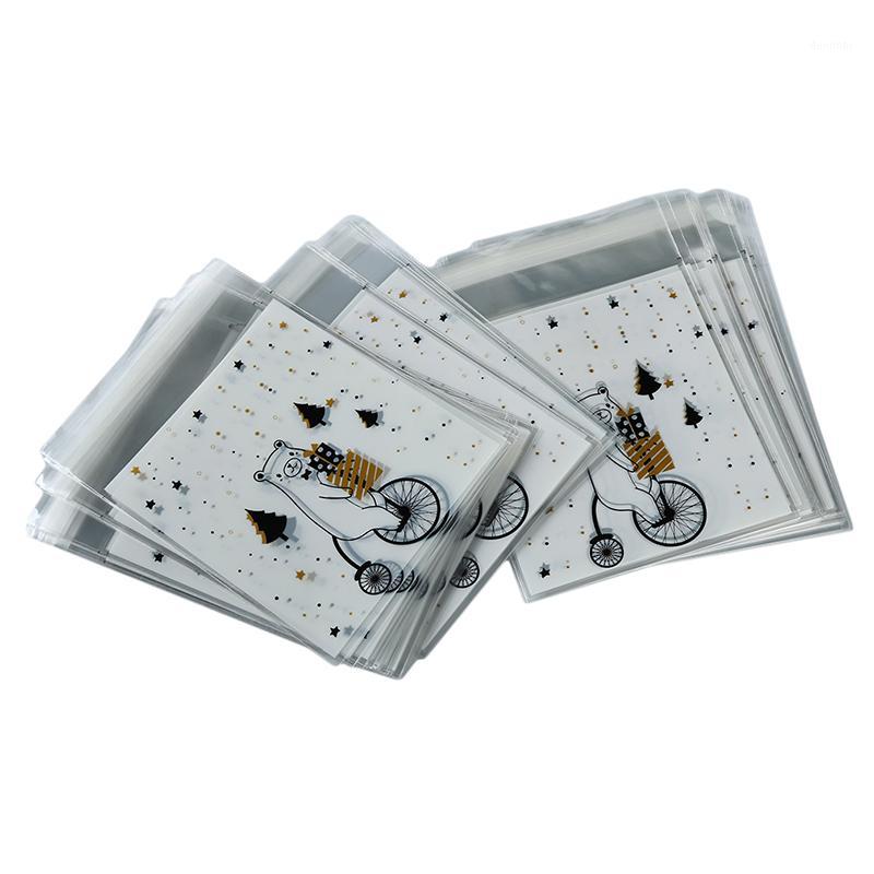 

100 Pcs Plastic Gift Bag Candy Goodie Bags Deer Bear Packaging Bag Snowflake Crisp Flower Biscuit Packaging1