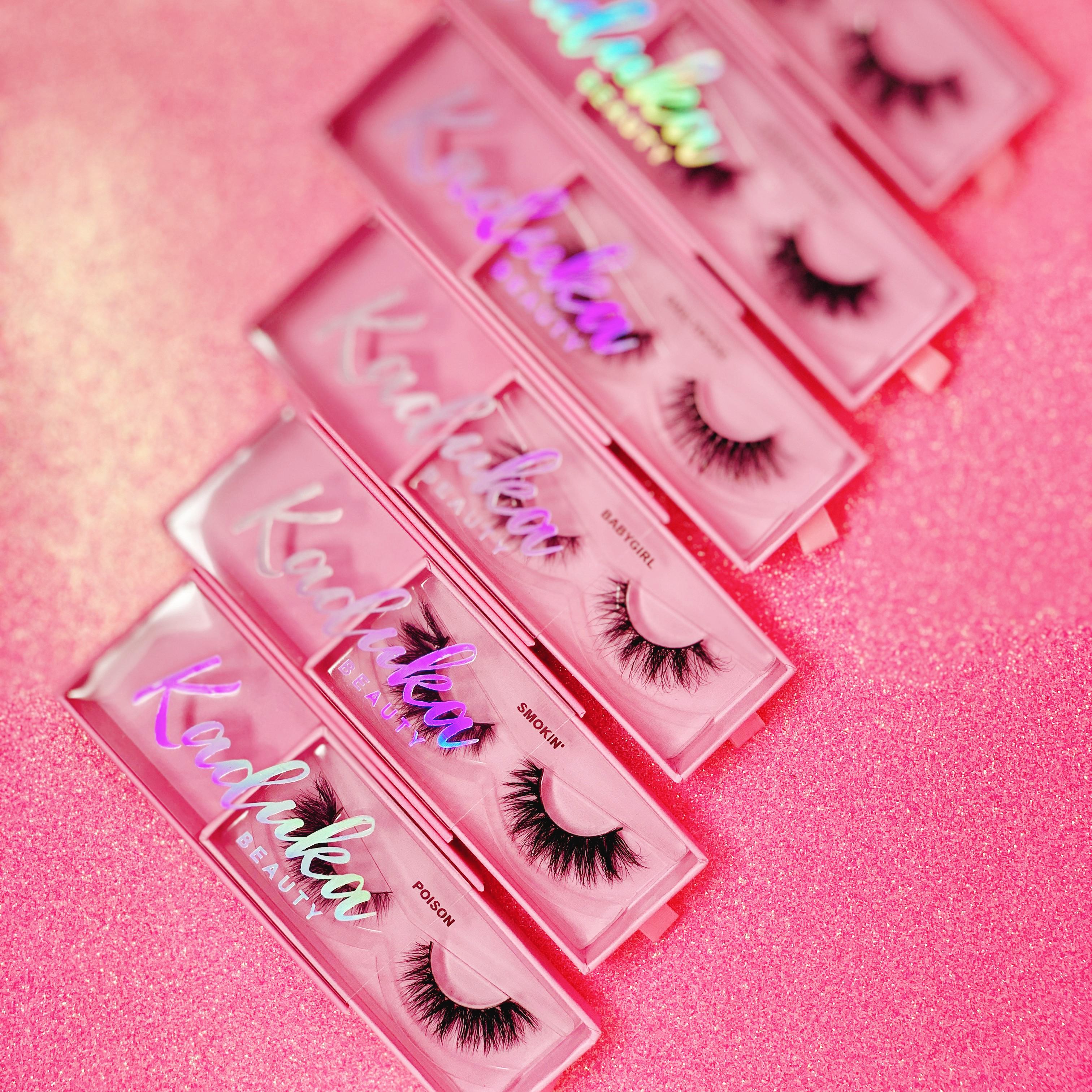 

empty lighter pink luxurys custom packaging box with gold stamping logo made by professional eyelash factory