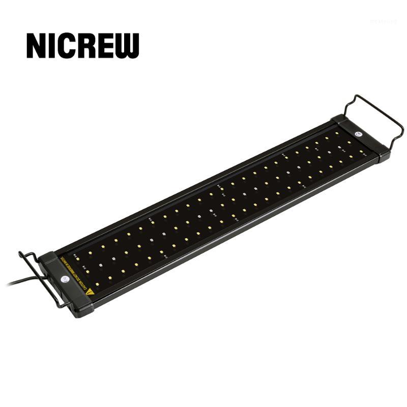 

Nicrew 50-68cm Aquarium LED Lighting Fish Tank Light Lamp with Extendable Brackets 60 White and 12 Blue LEDs Fits for Aquarium1