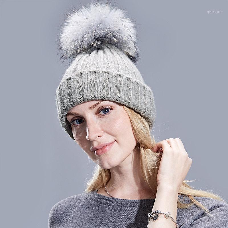 

Ladies Winter Knitted Hats Woolen Caps Autumn and Winter New Style Wool Warm Caps Thick Dyed Fur Ball Hats1