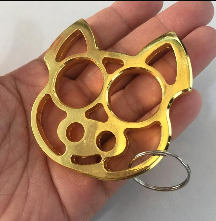 

pig key chain tiger rigng finger protective gear key chain Save your equipment outdoor safe double hand tool Fist knuckles iron fist4758