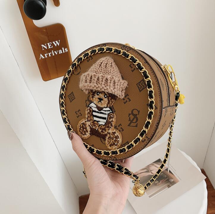 

Wholesale factory ladies leather shoulder bags This years popular round cartoon chain bag sweet and lovely round retro handbag Western style chains women backpack, Brown1-312