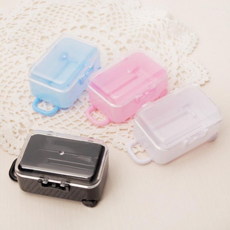 

12pcs/lot New Creative DIY Trolley Box Shape Transparent Plastic Candy Box Wedding Favors Birthday Party Gift1