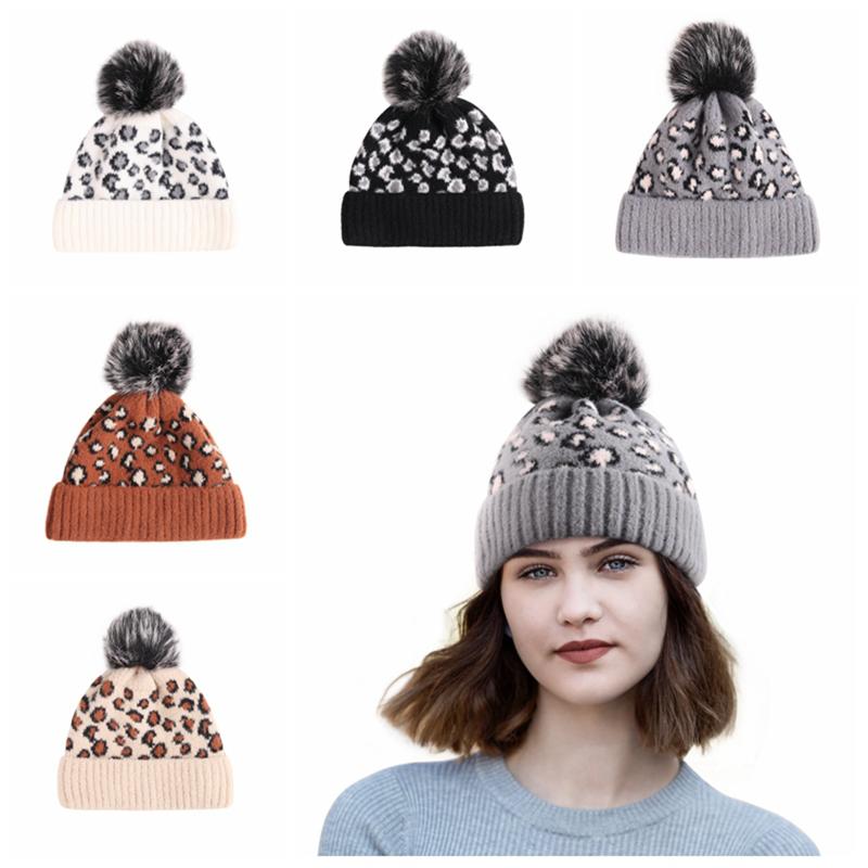 

Women\u2020s Winter Knit Hat Classic Leopard Print Warm Beanie Cap with Big Faux Fur Pom, White