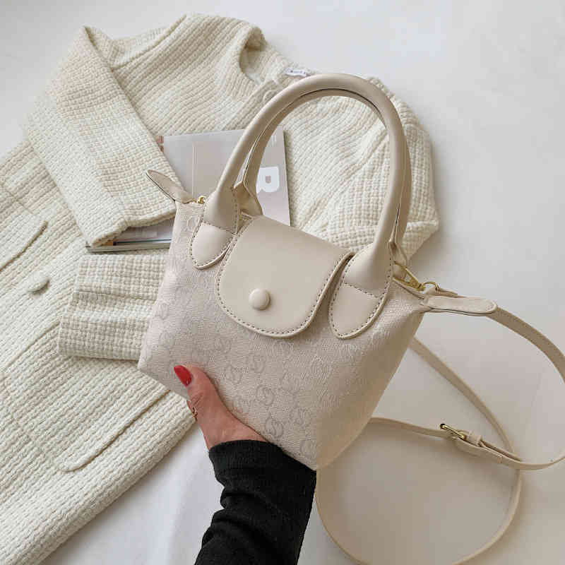 

Purse Portable women's autumn new sling shoulder version printing diagonal bag, White