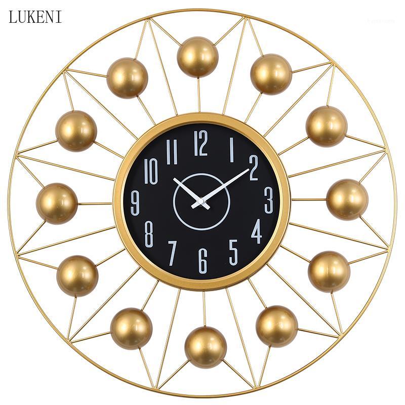 

Nordic Light Luxury Wall Clock Living Room Fashion Creative Wall Watch Modern Clock Simple Three-dimensional Decorative1