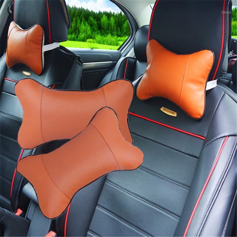 

High Quality Soft 1pcs Car Neck Pillow Perforating Design PU Leather Hole-digging Car Headrest pillow Auto Safety Accessories1
