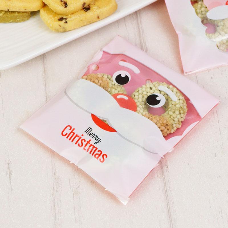 

50pcs Cartoon Cute Santa Claus Avatar Cookies Plastic bag Christmas Santa Party Candy Wrappers Resealable Self Adhesive Bags