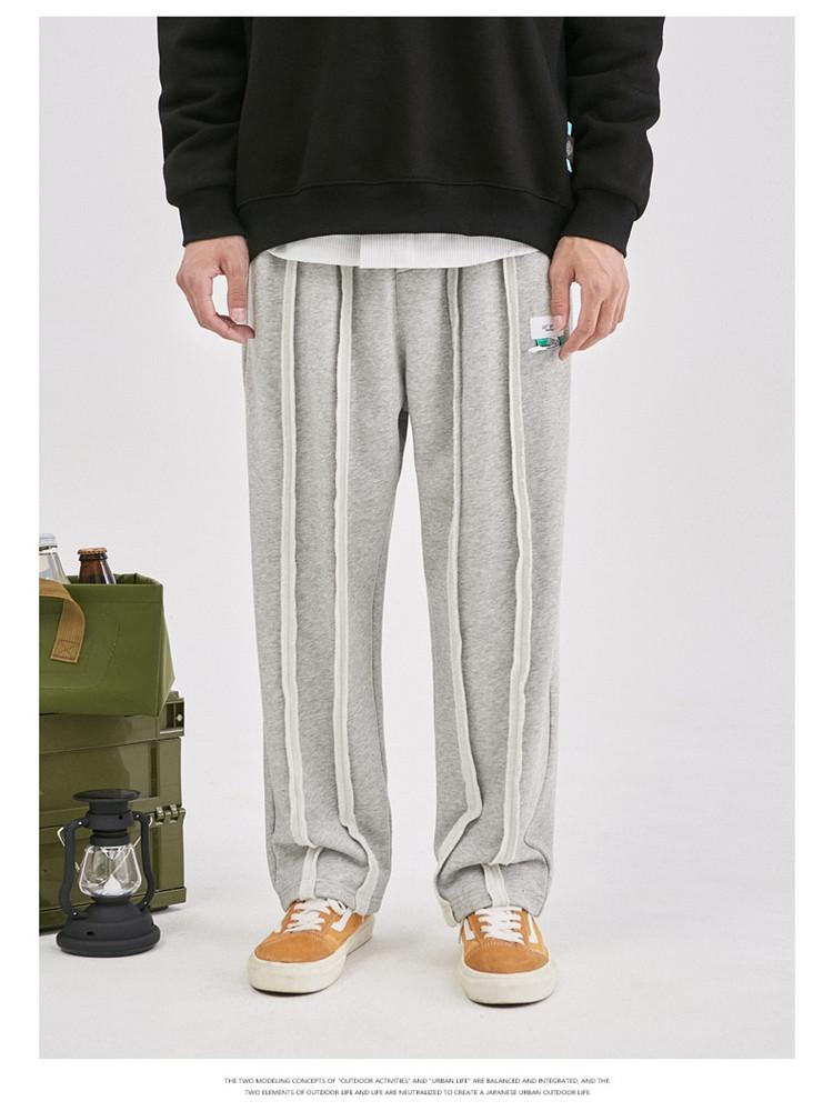 

2021 Autumn New Product Solid Color Stitching Wild Deconstruction Wind Straight Loose Sports Casual Pants Men, Black