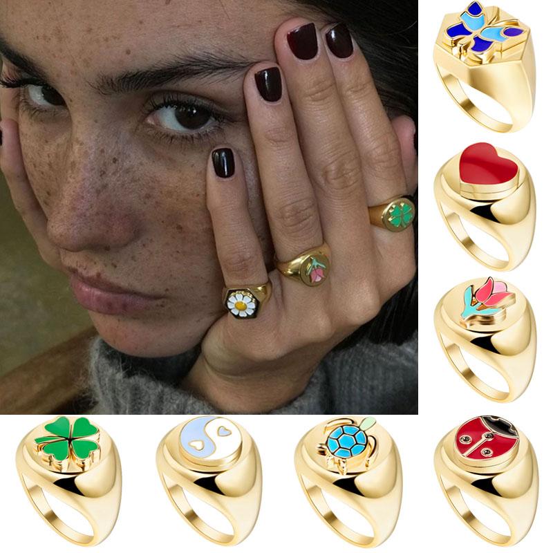 

AOMU Glazed Daisy Tulip Ring Female Fashion Punk Metal Clover Flower Gold Ring Personality Index Finger Tail Women