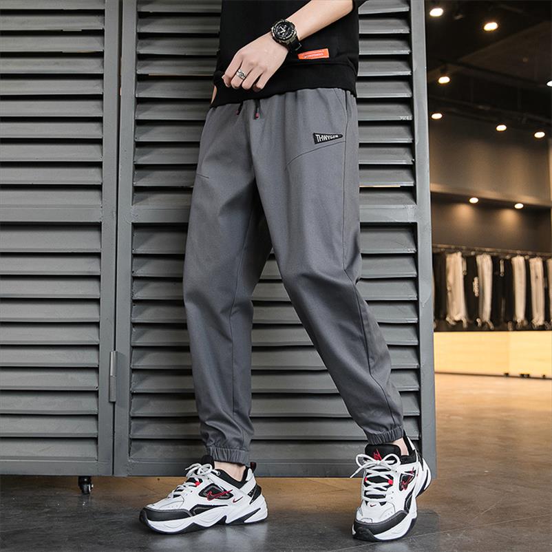 

2021 new sport pants fashion mens solid color streetwear drawstring pocket sports trousers casual beam feet pants, Black