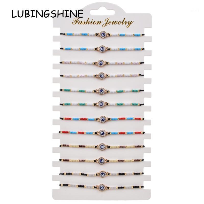 

12pcs/lot Evil Eye Charms Bracelet Set for Couples Women Girl Knit Adjustable Knot String Seed Bead Wristband Jewelry Gift1