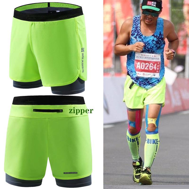 

Marathon running shorts men' and women' fitness fast dry three-point pants tight double layer professional track and field pan1, Black