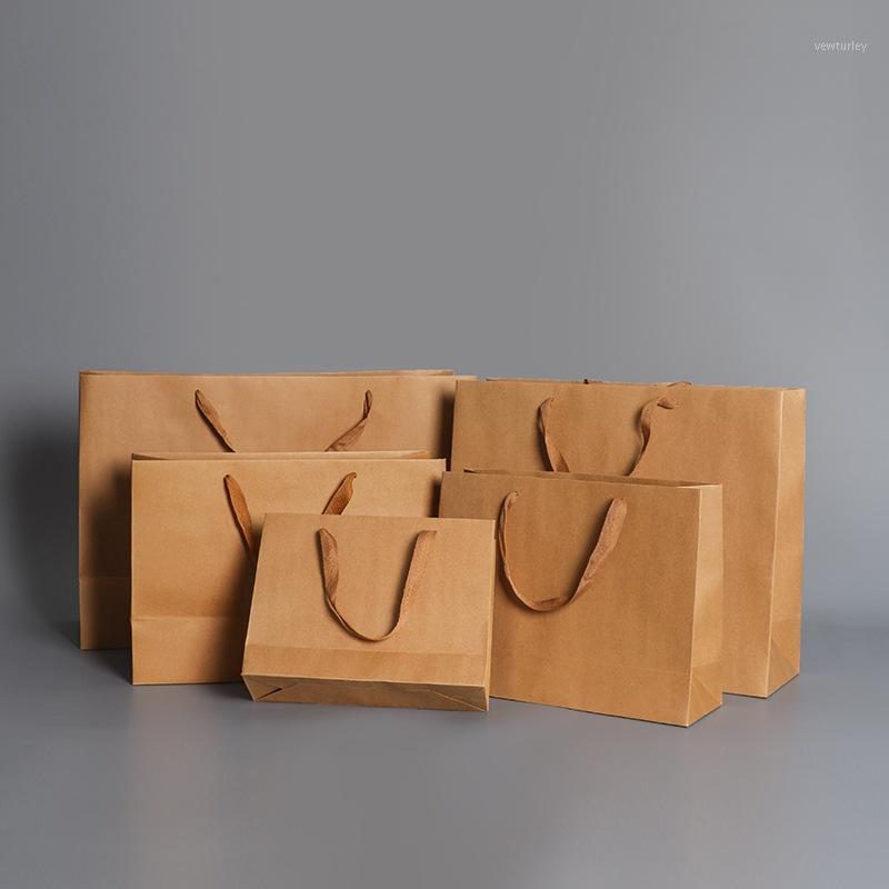 

10pcs/lot 7 size kraft paper bag with handles for Wedding Party Fashionable Jewelry clothes Packing bags Gift paper bags1