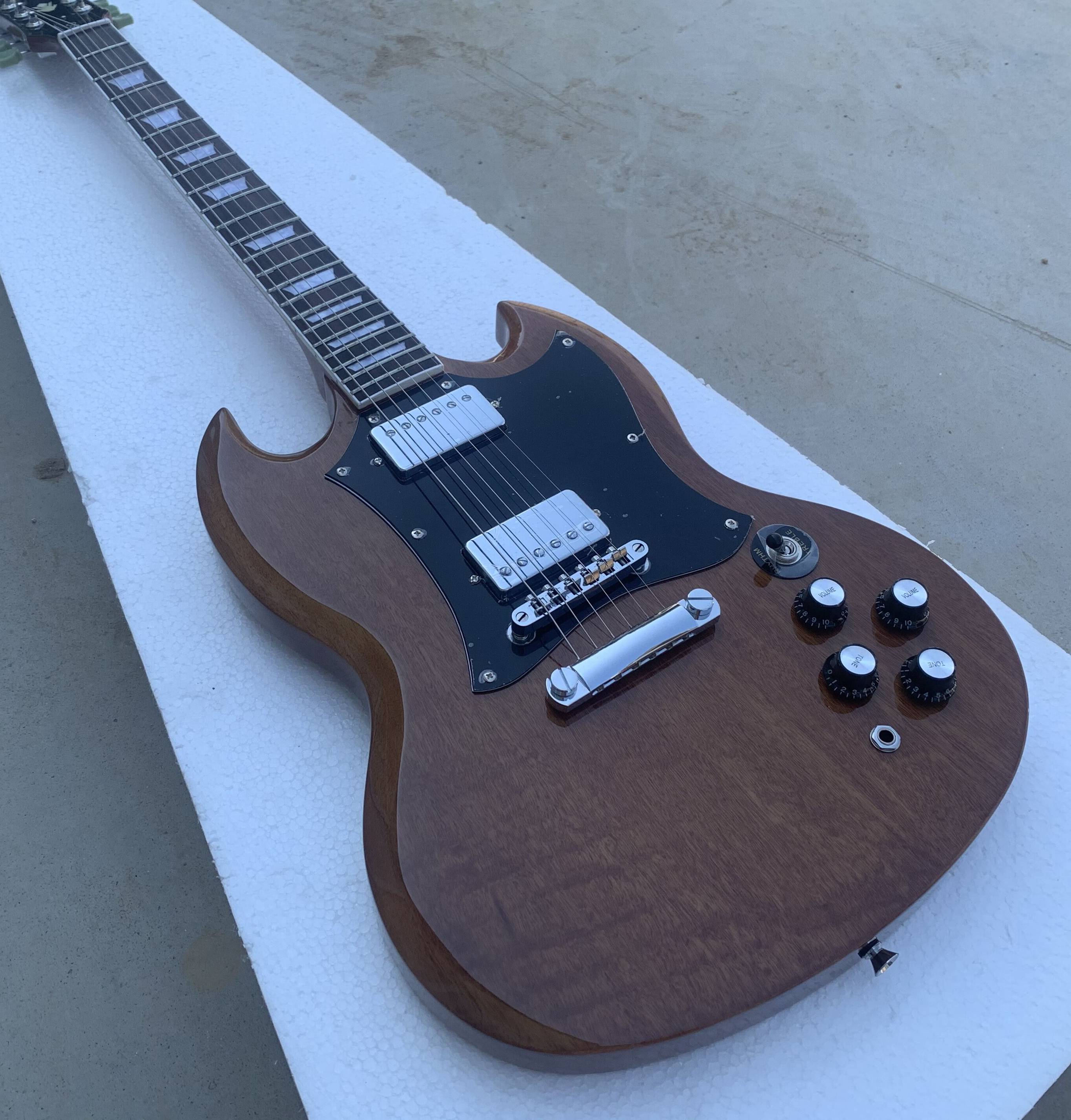 

Custom Shop Natural Walnut Brown SG Electric Guitar Rosewood Fingerboard, Pearl Trapezoid inlay, Chrome Hardware