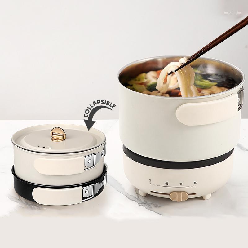 

220V Multifunction Electric Hot Pot with Folding Handle Mini Portable Travel Induction Cookers Split Type Cooking Pot 1.2L1