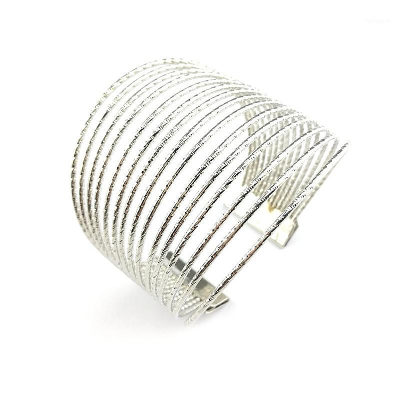 

Metal Circle Artistic Hollow Flower Pattern Open End Bracelet1