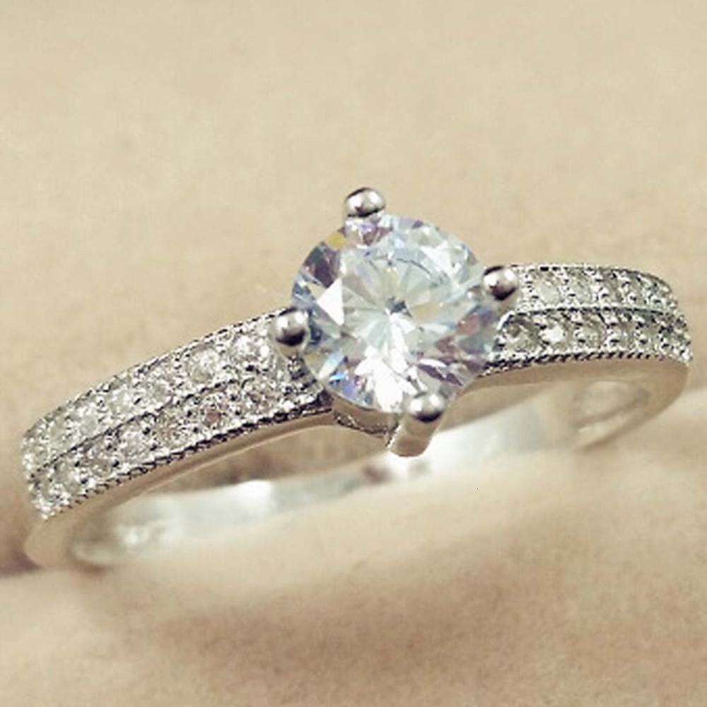 

Luxurys Designers Fashion Jz022 gold plated color retaining micro inlaid one C eight heart eight arrow men's and women's ring wedding ring