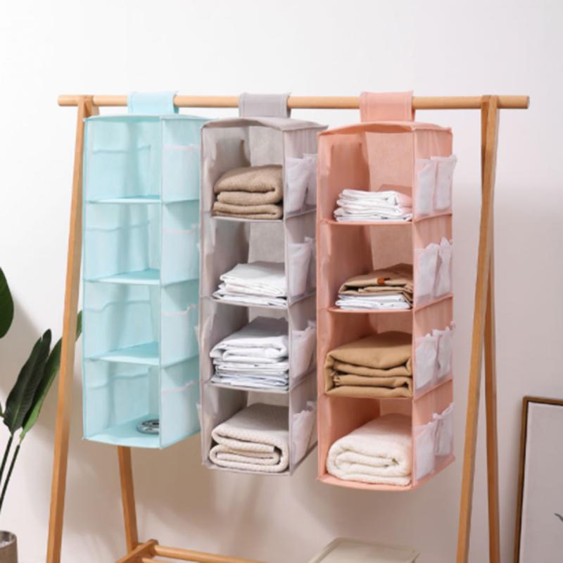 

Hanging Wardrobe Storage Rack Fabric Hanging Basket Storage Stand Can Be Folded with Side Pockets For Storing Clothes Items
