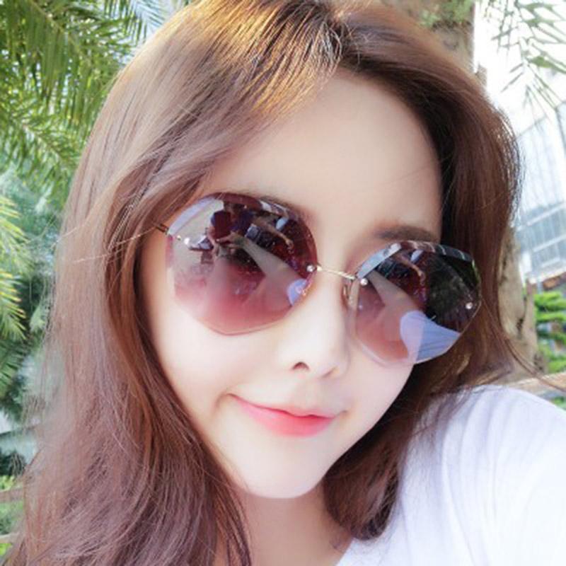 

New round sunglasses female oversized glasses gradient brown pink rimless glasses female models designer UV400 sunglasses1